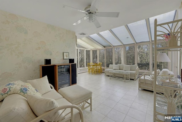 living area featuring light tile patterned floors, visible vents, lofted ceiling, and wallpapered walls