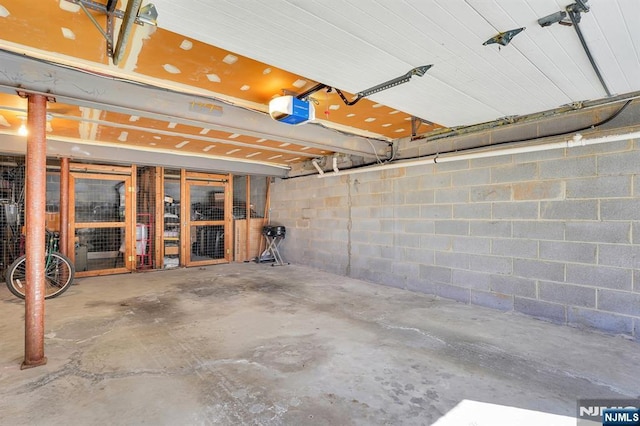 garage featuring a garage door opener