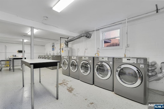 shared laundry area featuring washer and dryer