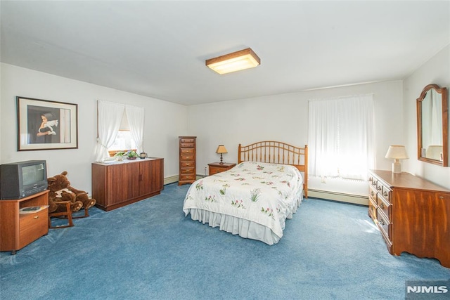 carpeted bedroom featuring baseboard heating