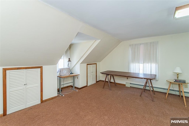 additional living space with lofted ceiling, carpet flooring, baseboards, and a baseboard radiator