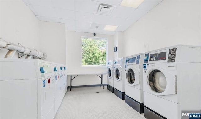 common laundry area with washing machine and dryer and visible vents