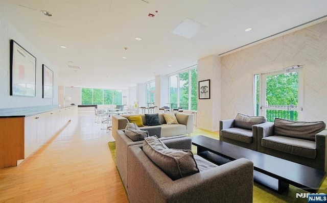 living room featuring recessed lighting and light wood-style floors