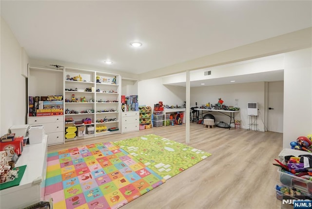 playroom featuring recessed lighting, visible vents, and wood finished floors