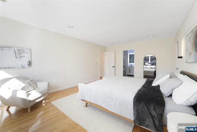 bedroom featuring recessed lighting, baseboards, and light wood finished floors