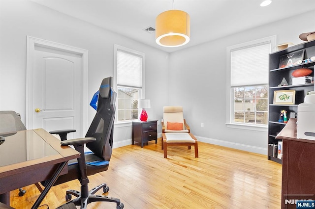 home office featuring visible vents, recessed lighting, wood finished floors, and baseboards