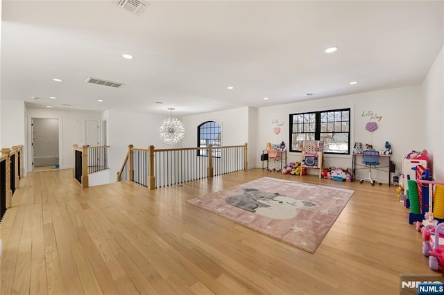 game room featuring light wood-style flooring, visible vents, and recessed lighting