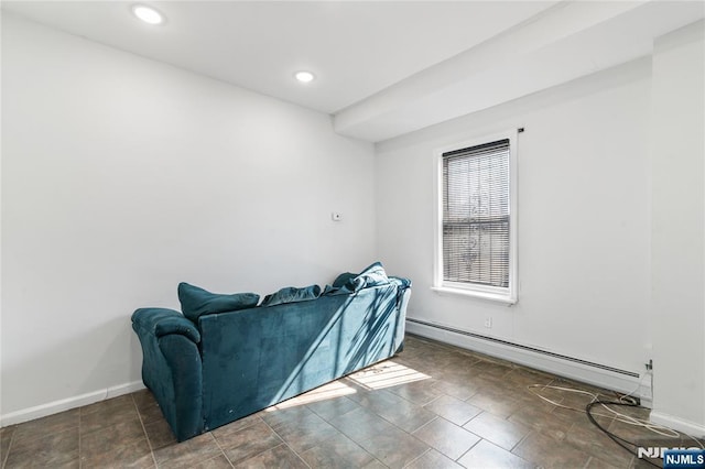 living room featuring recessed lighting, baseboards, and baseboard heating