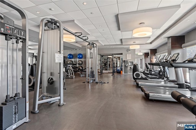 workout area with a drop ceiling