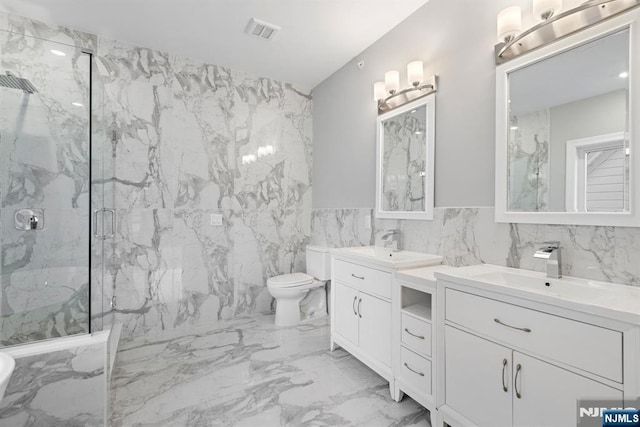 full bathroom with a sink, marble finish floor, a marble finish shower, and visible vents