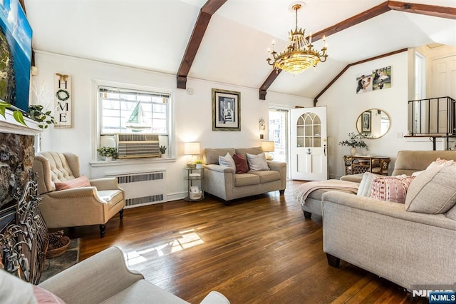 living room featuring a chandelier, dark wood-style flooring, a premium fireplace, beam ceiling, and radiator heating unit