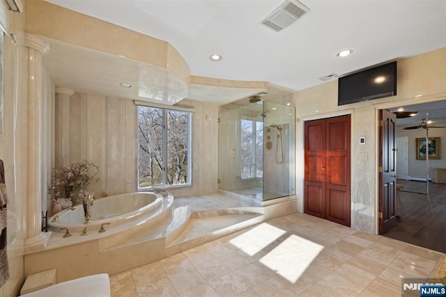 bathroom with a stall shower, a garden tub, visible vents, and recessed lighting