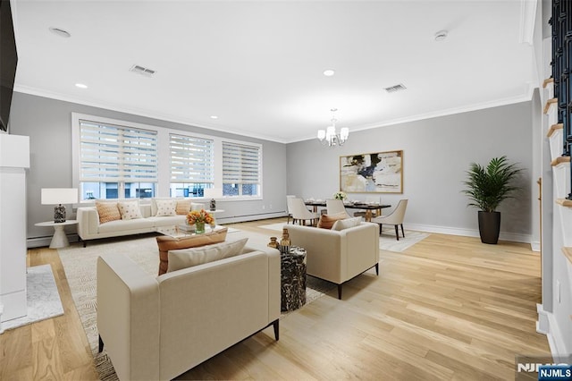 living room featuring light wood finished floors, an inviting chandelier, visible vents, and crown molding