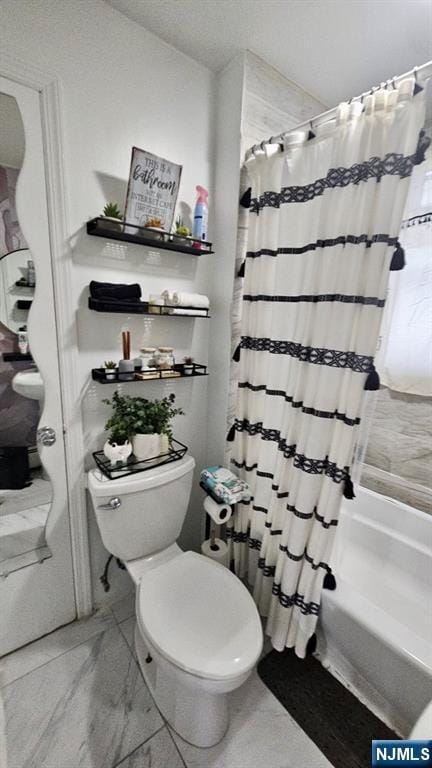 bathroom with shower / tub combo, a textured ceiling, and toilet