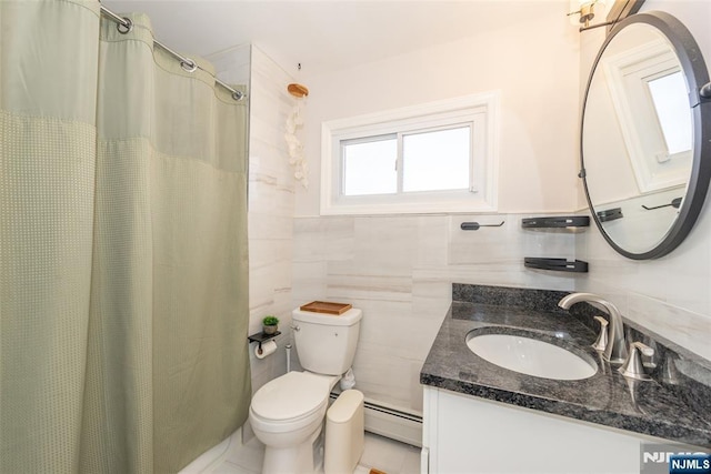 bathroom featuring toilet, a shower with curtain, baseboard heating, vanity, and tile walls