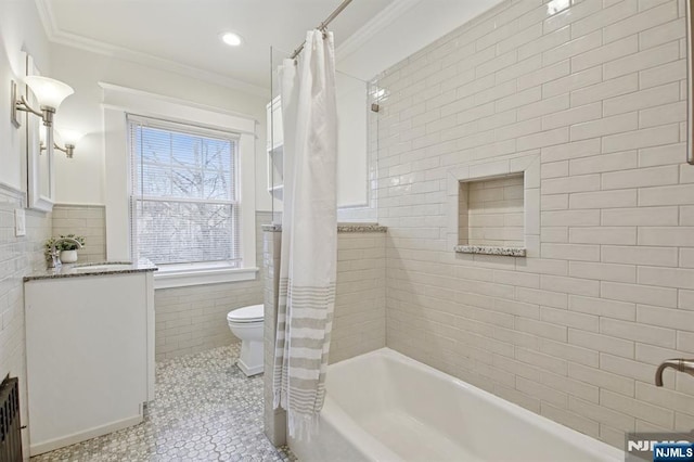 bathroom featuring crown molding, tile walls, toilet, shower / tub combo, and tile patterned floors