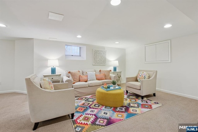 living room with carpet floors, baseboards, and recessed lighting