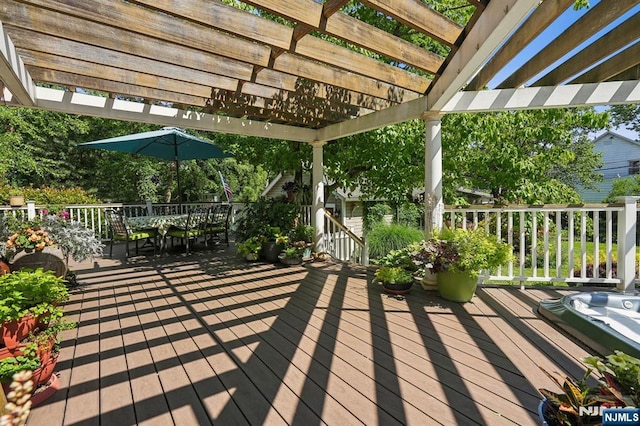 wooden deck with outdoor dining space and a pergola