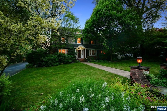 view of front of home with a front yard