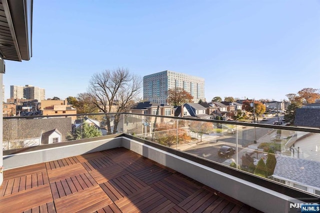 balcony featuring a city view