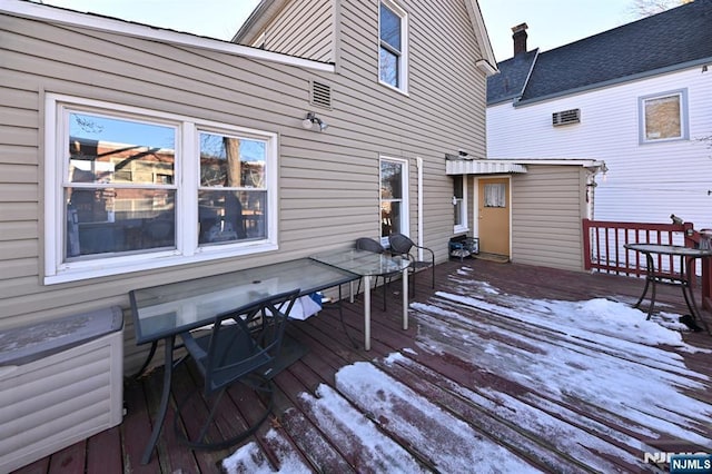 view of snow covered deck