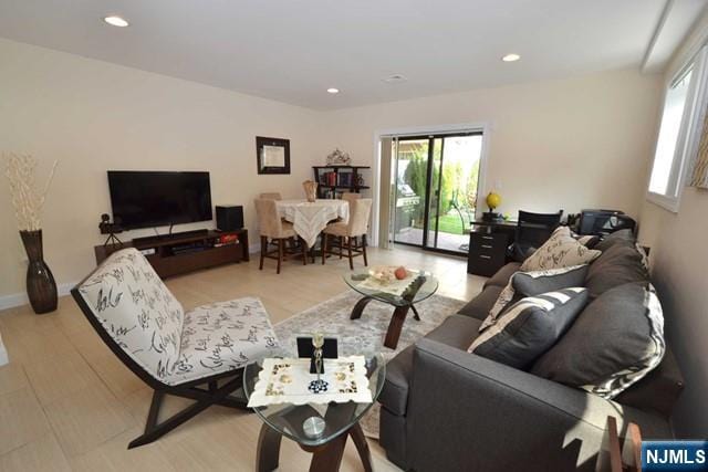 living room featuring recessed lighting