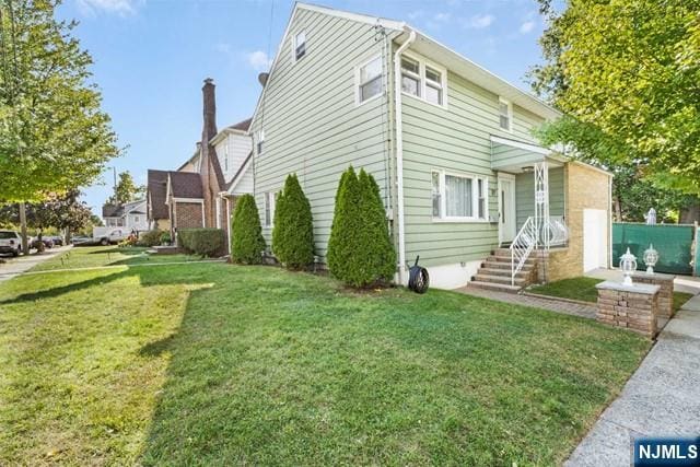 view of property exterior featuring a yard