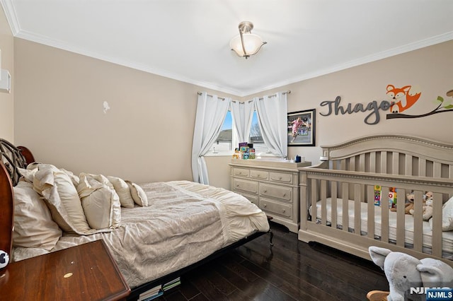 bedroom featuring ornamental molding and dark wood-style flooring