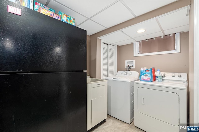 laundry room featuring laundry area and washer and clothes dryer