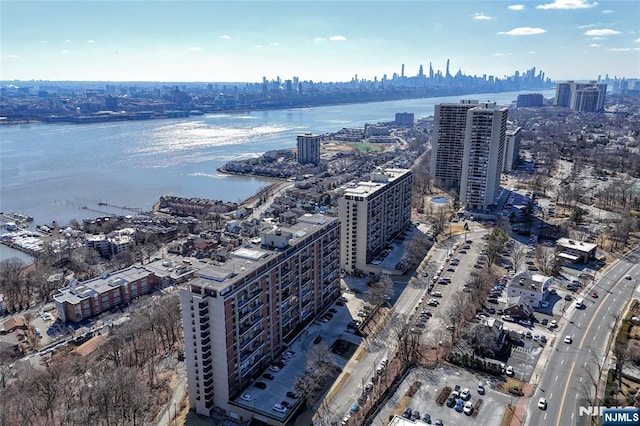 aerial view featuring a water view and a city view