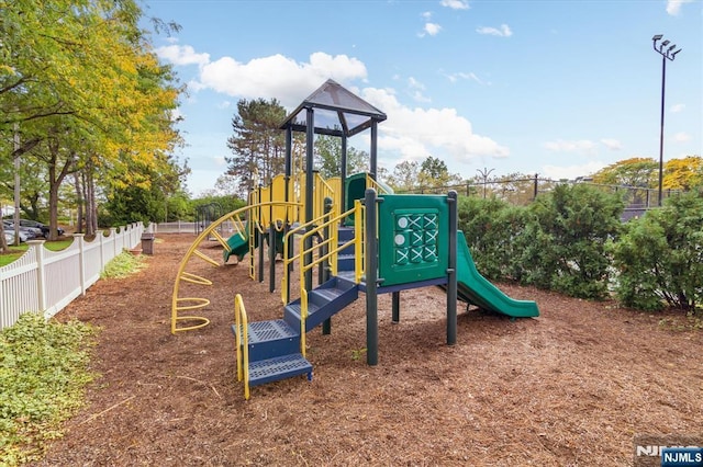 community playground featuring fence