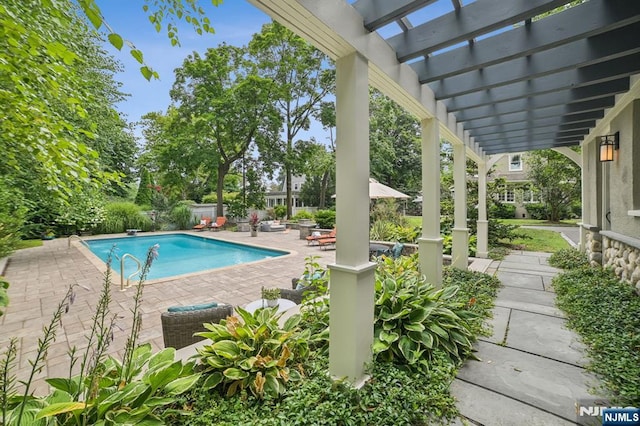 pool with a diving board, central AC, a patio area, and a pergola