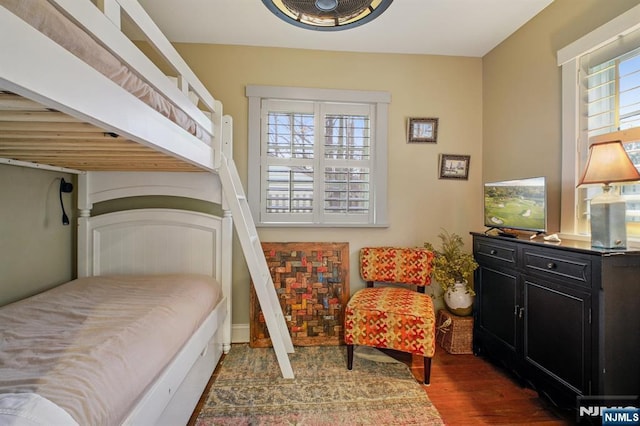 bedroom featuring wood finished floors