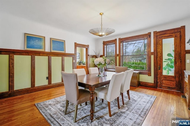 dining room featuring light wood-style floors