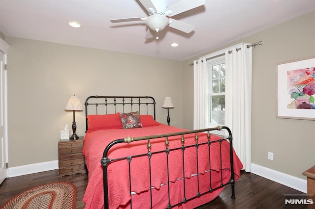 bedroom featuring recessed lighting, wood finished floors, and baseboards