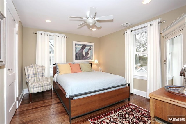 bedroom with baseboards, visible vents, ceiling fan, wood finished floors, and recessed lighting