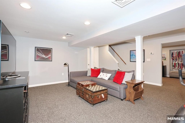 carpeted living room featuring baseboards, visible vents, and recessed lighting