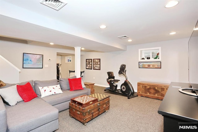 carpeted living area with recessed lighting, visible vents, and baseboards