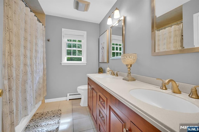 full bath with baseboard heating, tile patterned flooring, a sink, and toilet