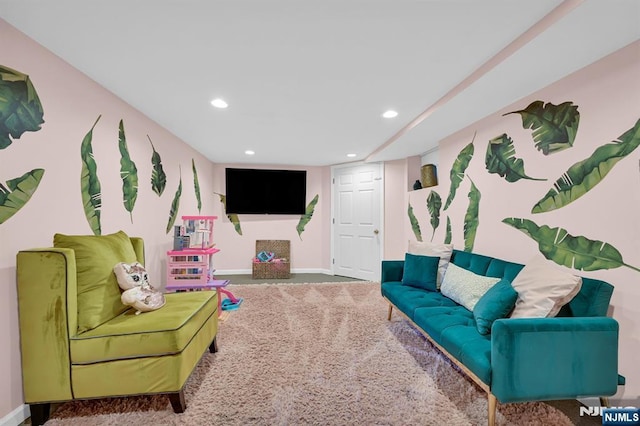 living room with baseboards, carpet, and recessed lighting