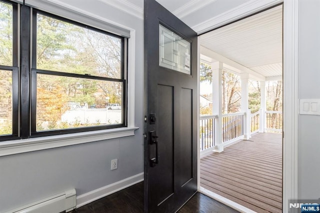 doorway featuring baseboards, a baseboard heating unit, and dark wood-type flooring