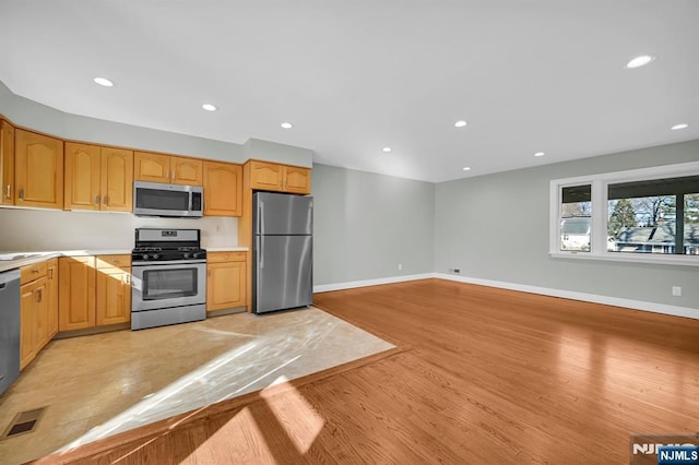 kitchen with light wood-style flooring, visible vents, stainless steel appliances, and recessed lighting