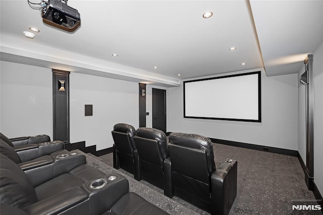 home theater room with baseboards and recessed lighting