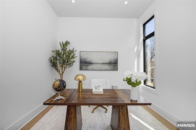 home office featuring recessed lighting, wood finished floors, visible vents, and baseboards