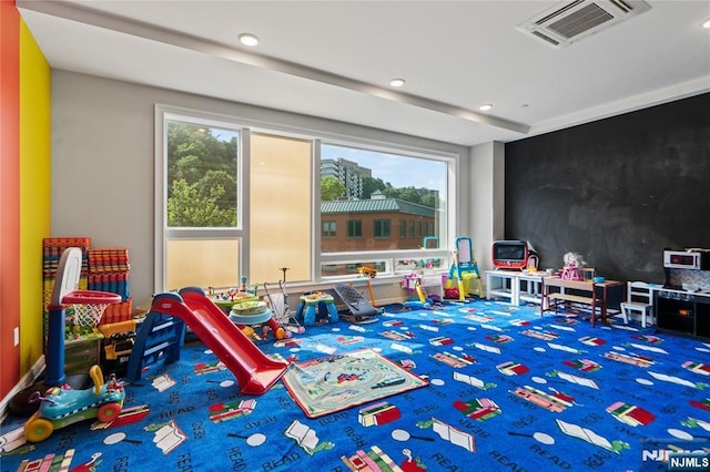 game room featuring baseboards, carpet, visible vents, and recessed lighting