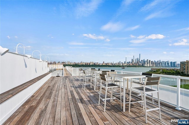 deck featuring a water view and a view of city