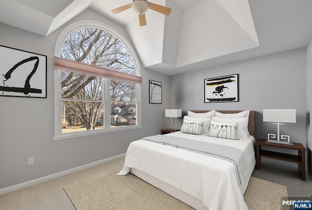 carpeted bedroom with a ceiling fan, baseboards, and high vaulted ceiling