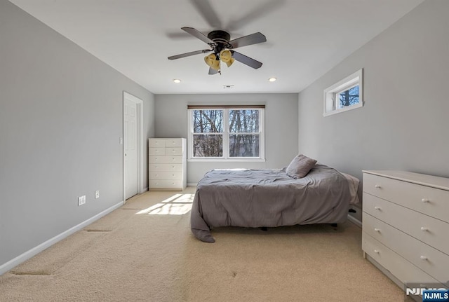 bedroom with recessed lighting, a ceiling fan, baseboards, and light carpet