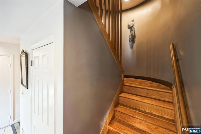 stairs featuring baseboards