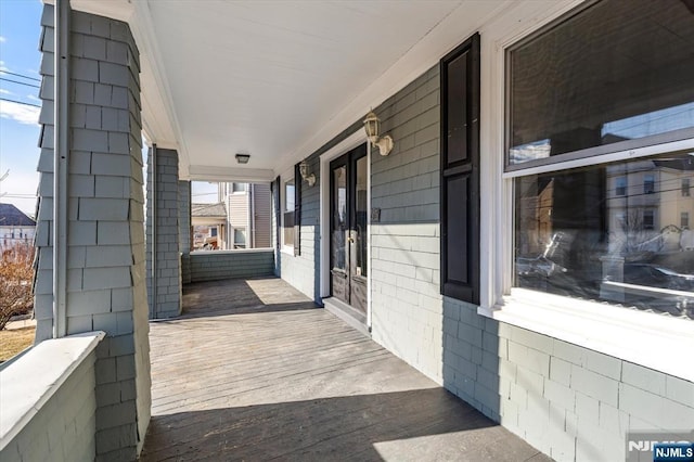 view of patio featuring a porch